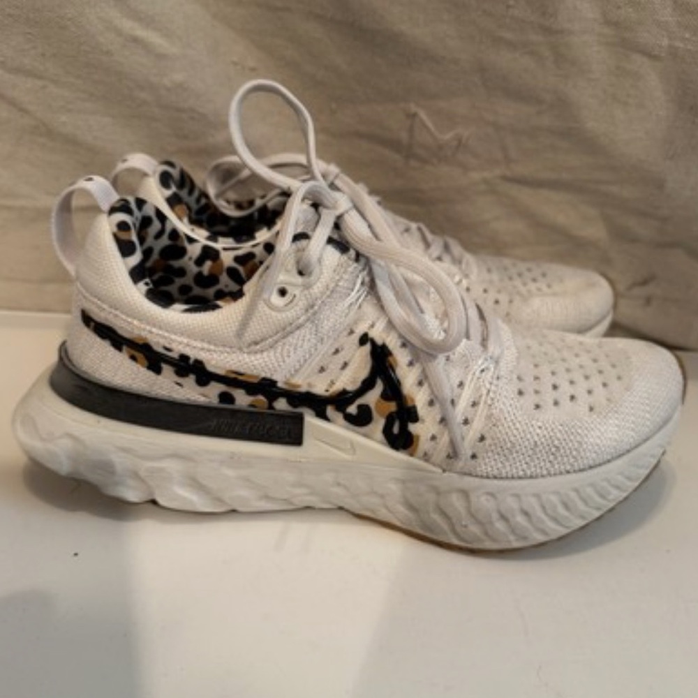 Nike White and Black Leopard Accent Sneakers